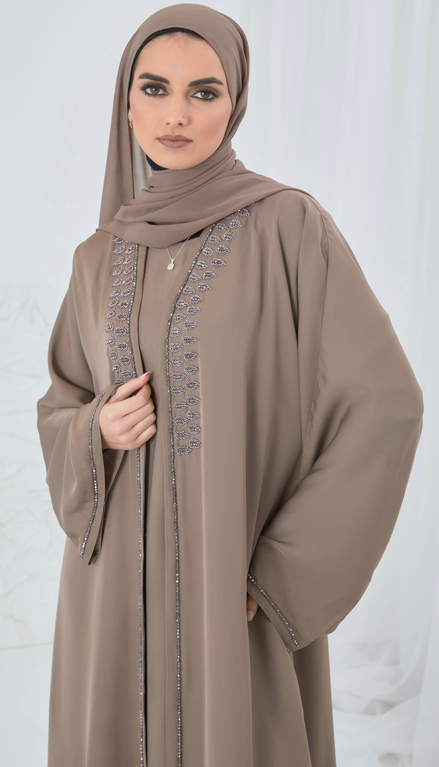 camel embellished abaya