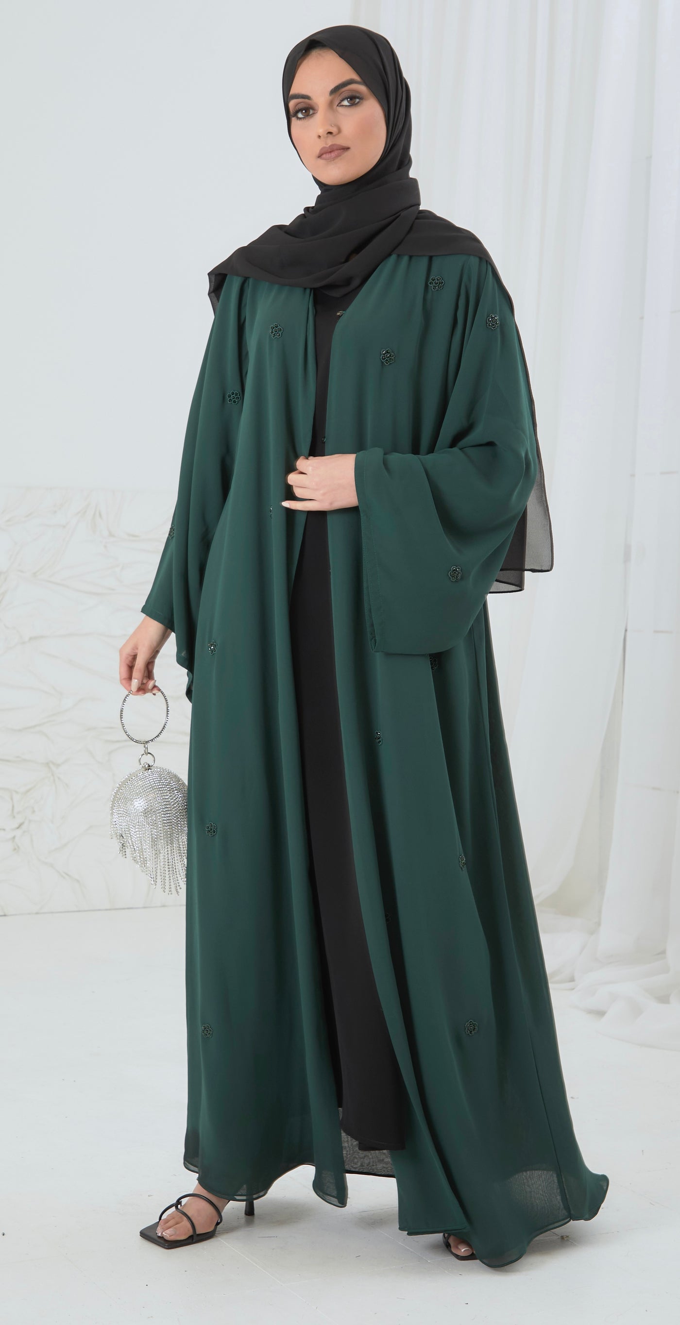 green open abaya with scattered floral embellishments